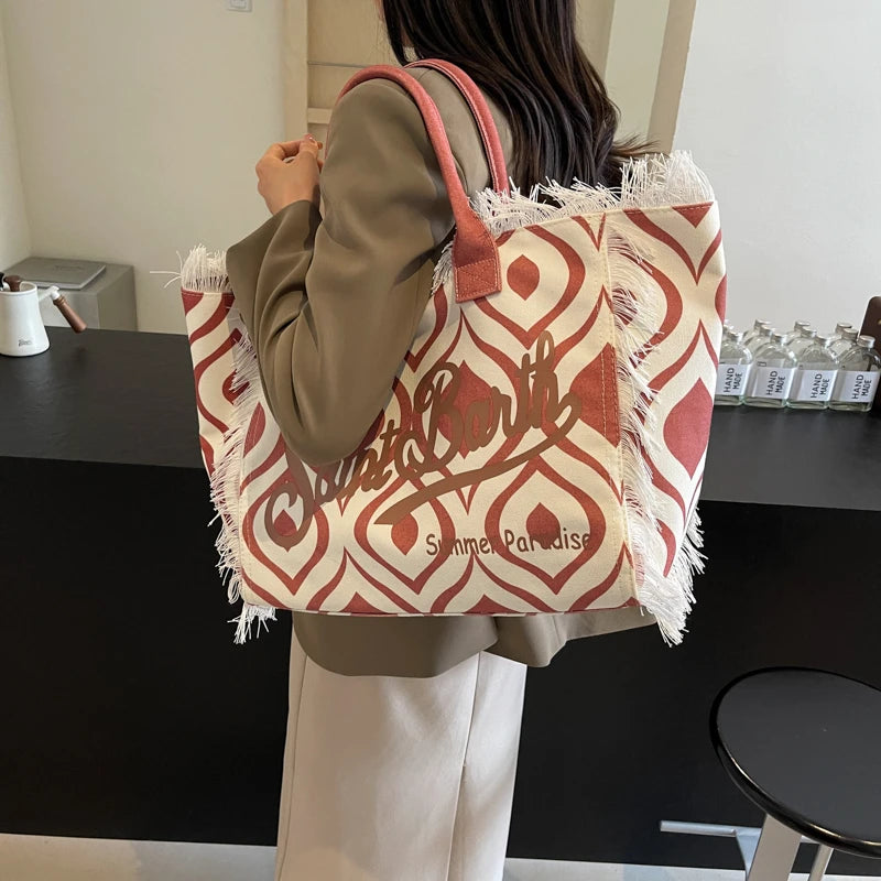 Popular Korean letters tassel canvas bag large-capacity bag simple commuting students to single shoulder Tote bag.