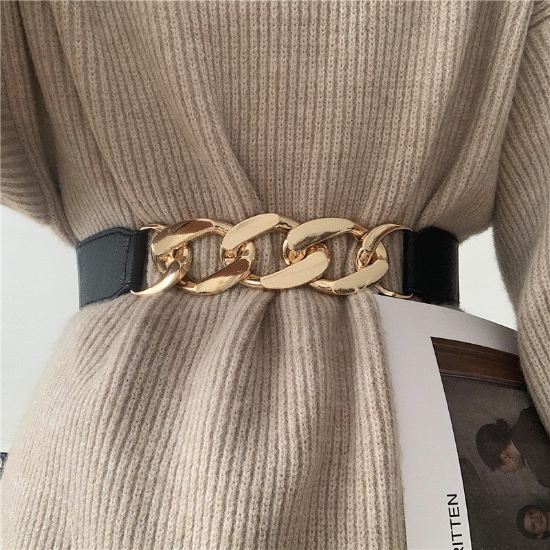 Stylish Elastic PU Leather Belt with Metal Chain Buckle and Rivet Details for Women.