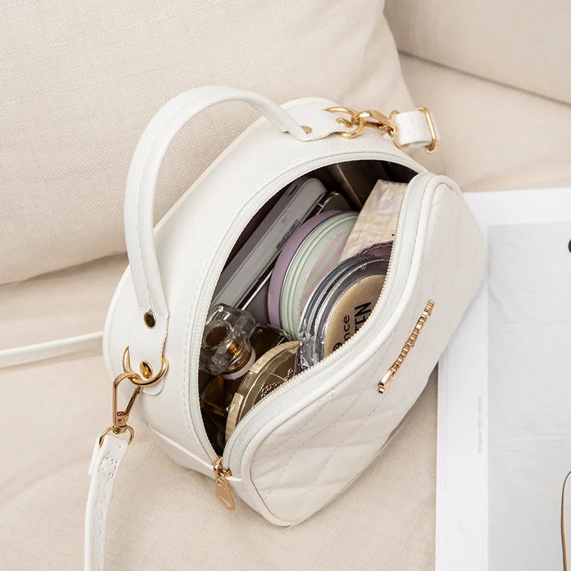 2023 New Elegant Rhombus Shell Bag Fashion Simple Embroidered Shoulder Messenger Bag Handbag.