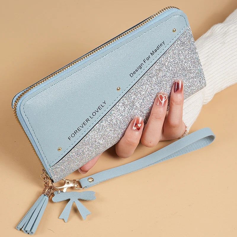 2024 New Purse Long Female Zipper Purse Female Korean Version Of The Patchwork Color Tassel Multi-card Bag Mobile Phone Bag.