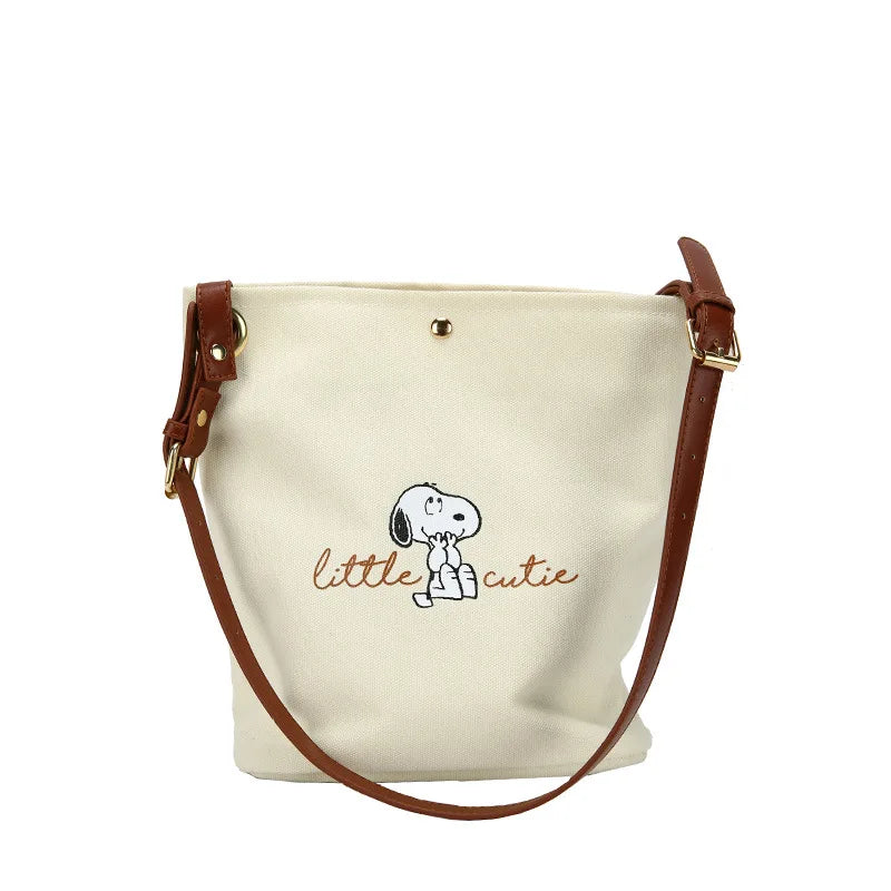 MINISO Disney Series Snoopy Women's Cute Bucket Bag Fashion Canvas Shoulder Bag Classic Letter Print Casual Crossbody Bag.