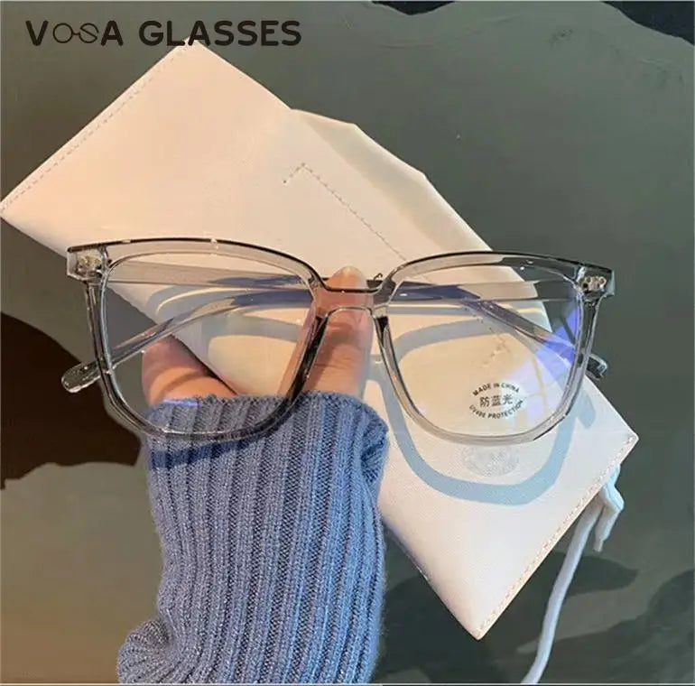 Stylish Oversized Transparent Square Myopia Glasses for Men and Women with Anti-Blue Light Lenses (-600 to 0).