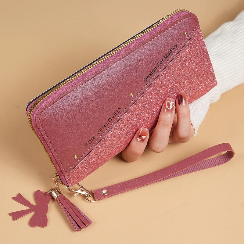 2024 New Purse Long Female Zipper Purse Female Korean Version Of The Patchwork Color Tassel Multi-card Bag Mobile Phone Bag.