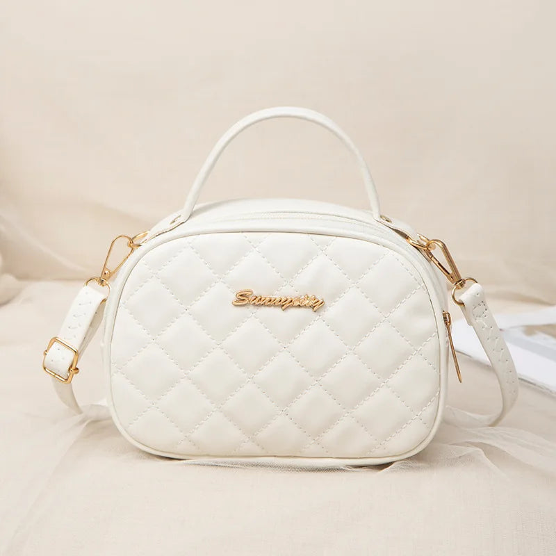 2023 New Elegant Rhombus Shell Bag Fashion Simple Embroidered Shoulder Messenger Bag Handbag.