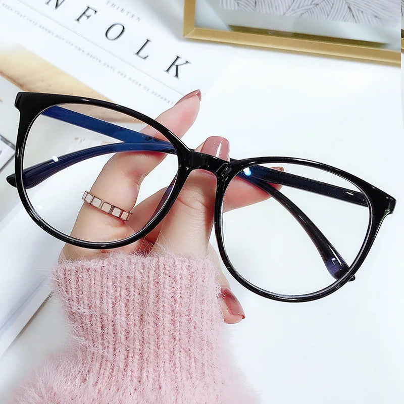 Unisex Transparent Blue Light Blocking Round Glasses with Acrylic Lenses - Anti Eye Strain Optical Frames for Prolonged Screen Use.