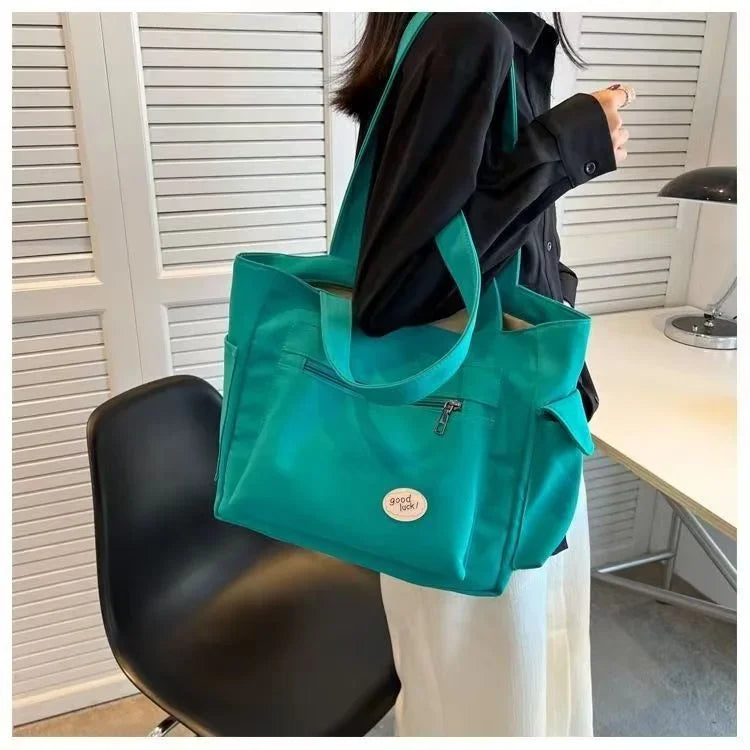 Women's Fashion Shoulder Bag Class Large Capacity Student Tote Bag 2024 New Canvas Commuter Handbag Women Bag.