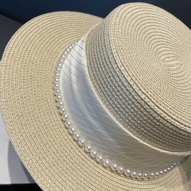 2024 Stylish Wide Brim Straw Sun Hat for Women with Pearl Chain - UV Protection Beach Cap.