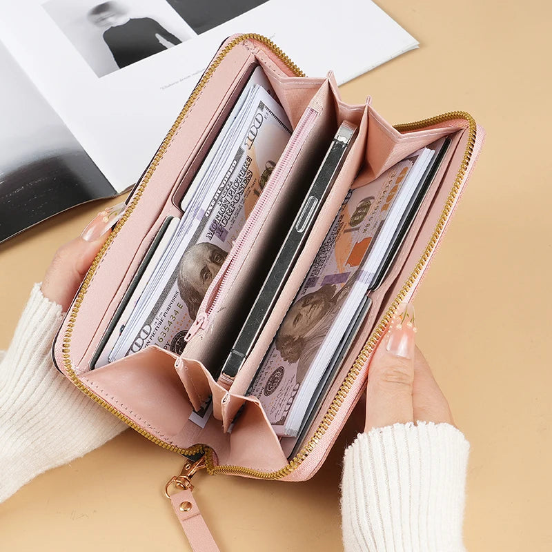 2024 New Purse Long Female Zipper Purse Female Korean Version Of The Patchwork Color Tassel Multi-card Bag Mobile Phone Bag.