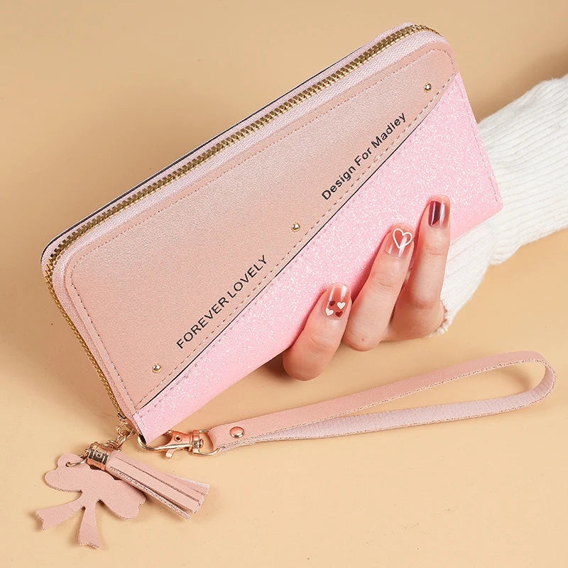 2024 New Purse Long Female Zipper Purse Female Korean Version Of The Patchwork Color Tassel Multi-card Bag Mobile Phone Bag.