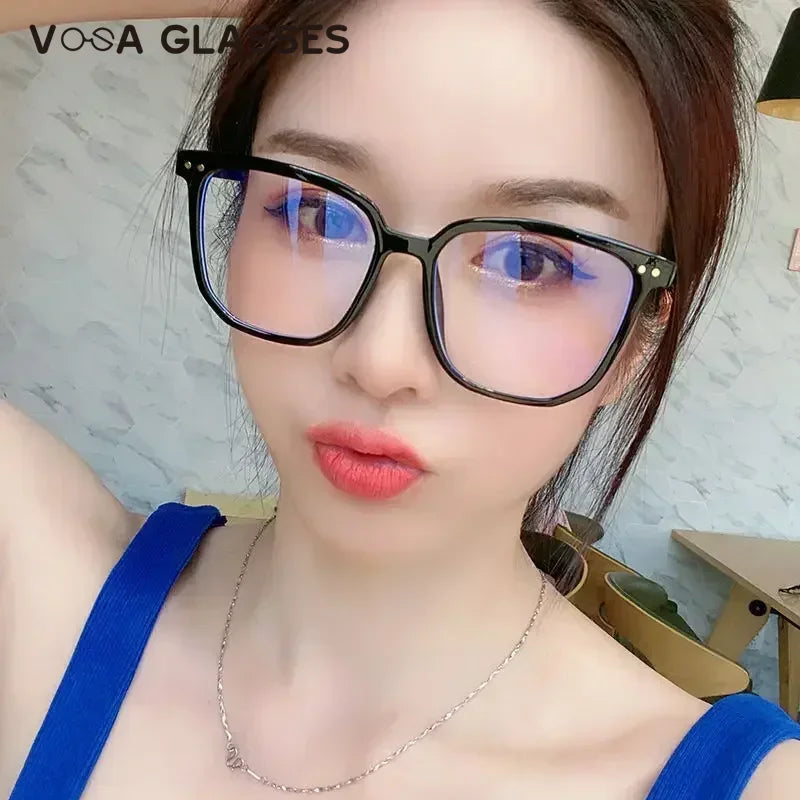 Stylish Oversized Transparent Square Myopia Glasses for Men and Women with Anti-Blue Light Lenses (-600 to 0).